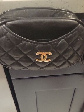 CHANEL Black Quilted Leather Mini Belt Bag with Gold CC